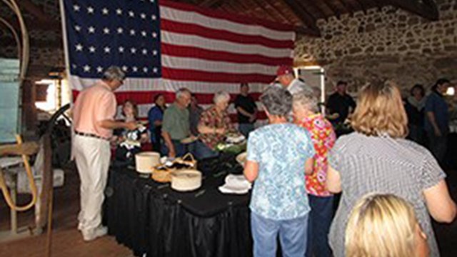 People having dinner in the Quartermaster Warehouse.