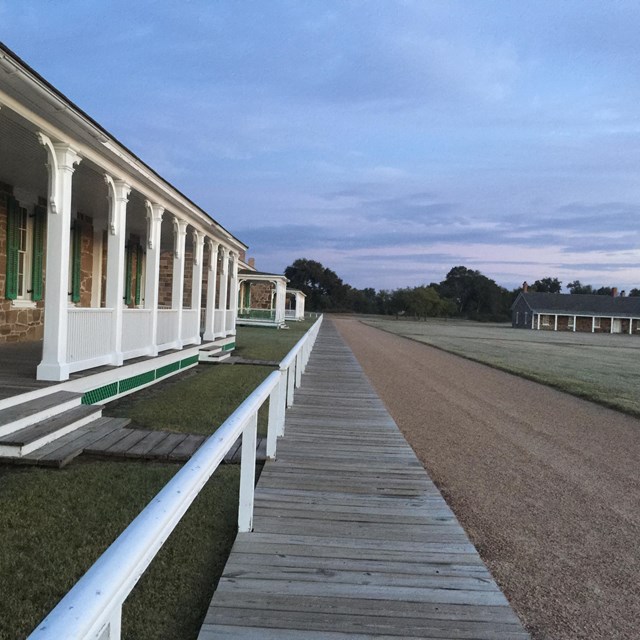 Boardwalk in front of the sandstone officers' quarters.