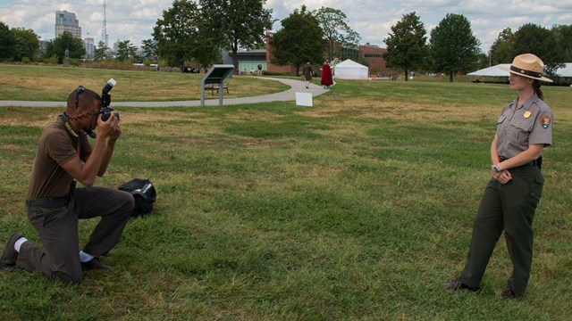 A visitor taking a picture of a ranger.