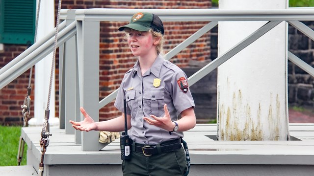 A ranger giving a program inside historic star fort.