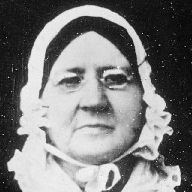 A black and white photograph of Mary Pickersgill in a bonnet.