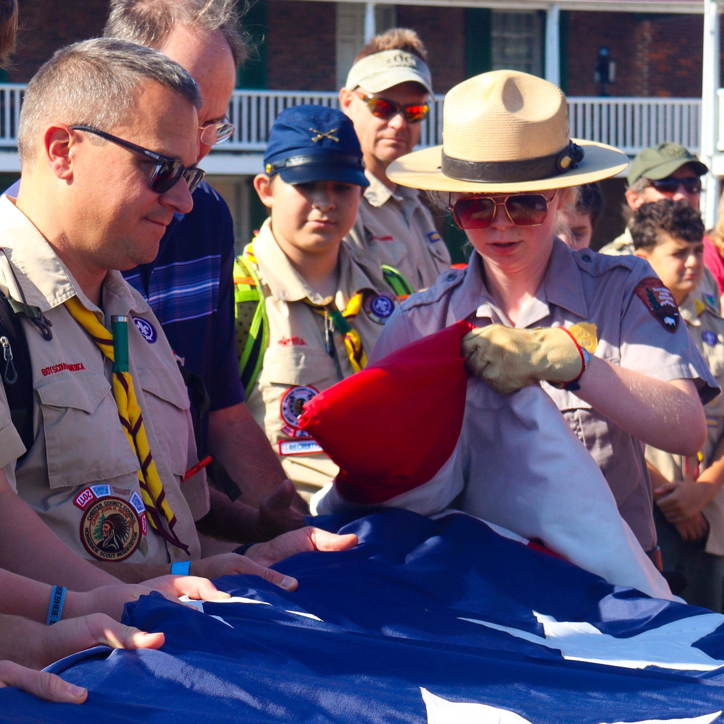 A ranger giving a flag program inside historic star fort.