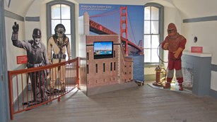 Golden Gate Bridge exhibit with various bridge workers