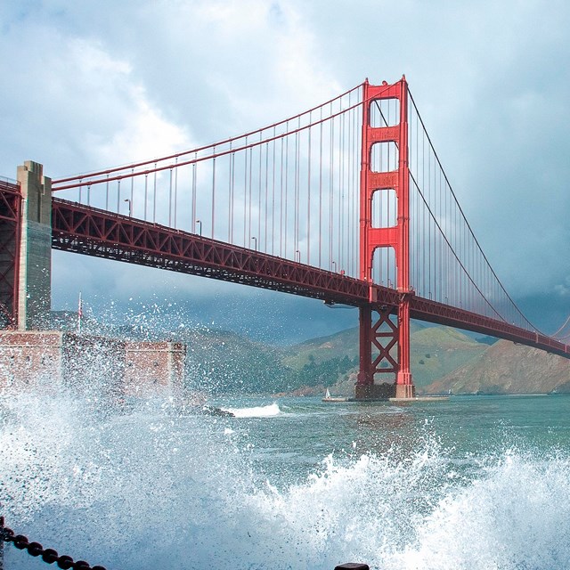 Splash of water over fort point and ggbridge