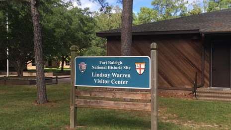 the entrance sign to the fort raleigh visitor center