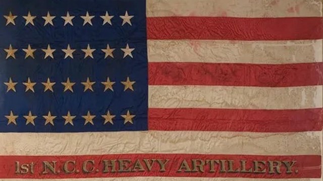 A regimental flag of the 14th artillery in the design of the U.S. flag