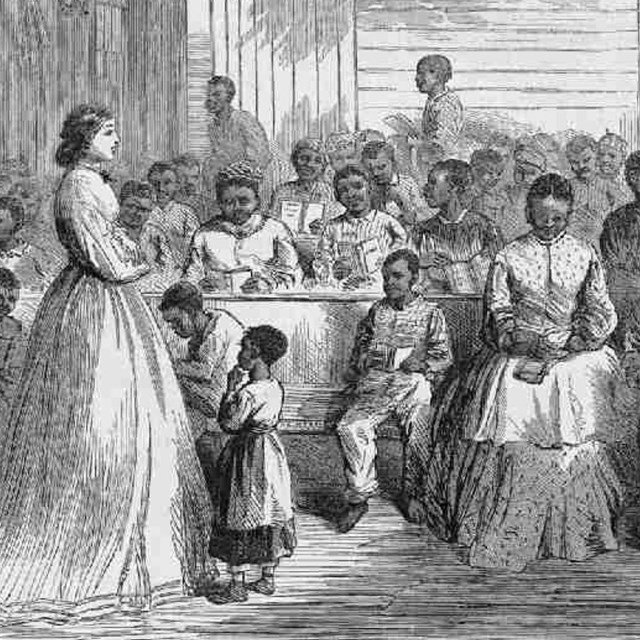 black and white drawing of 19th century white school teacher and her African American students. 
