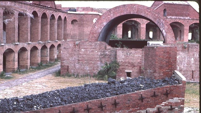 brick fort interior wall with arches