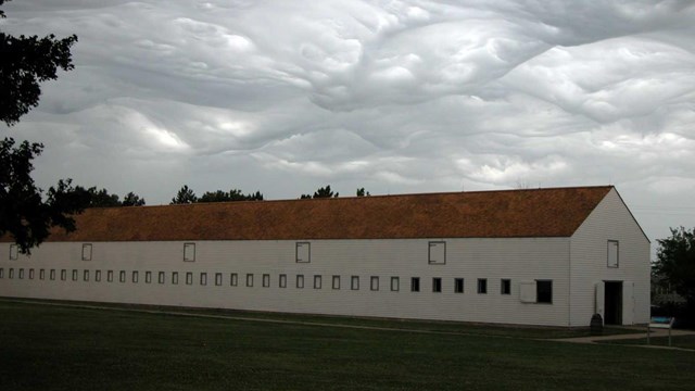 long building with windows and roof 