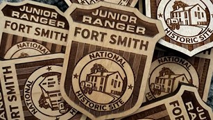 Junior Ranger Badge with text reading Junior Ranger Fort Smith National Historic Site.