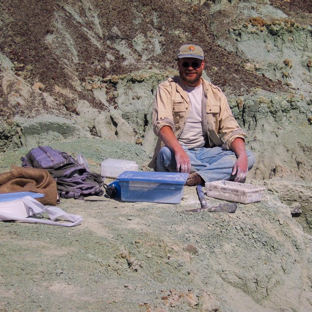 person in fossil quarry