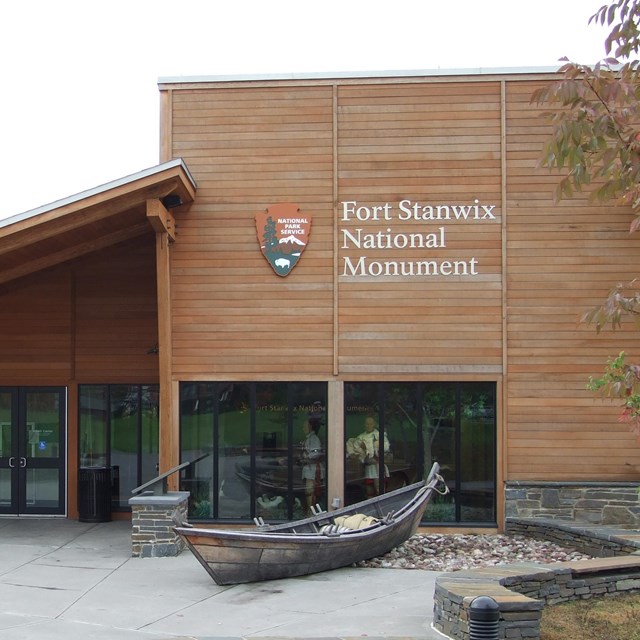 A large building with a National Park Service arrowhead on it's side. 