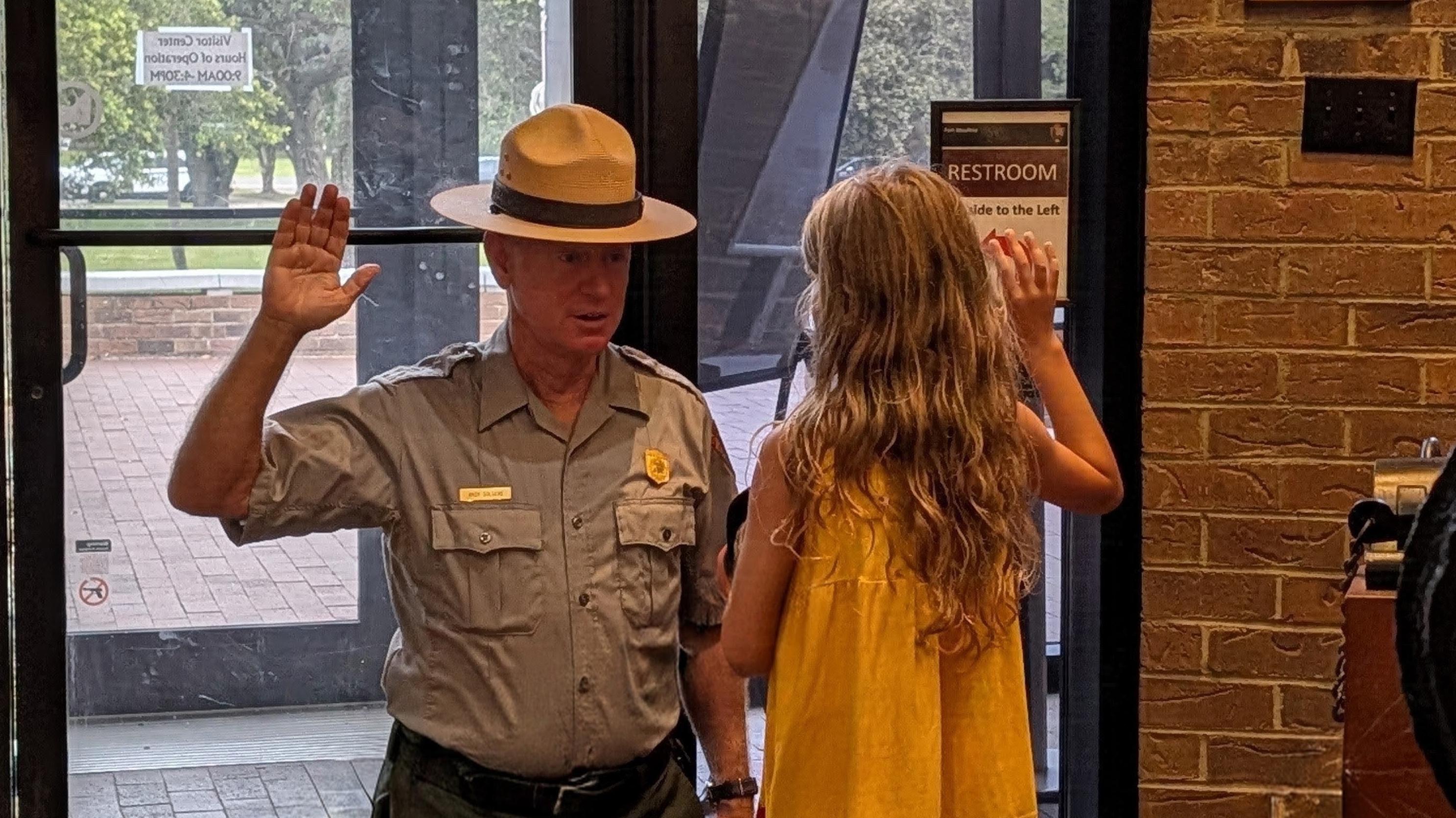A ranger swears in a new Junior Ranger