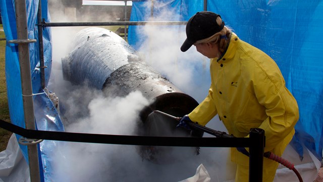 Woman power washing cannon