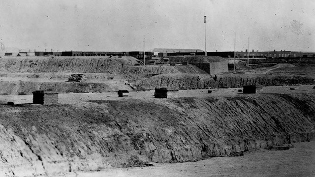 Photo of earthworks surmounted by flagpole