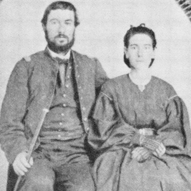 image of seated couple wearing 19th-century clothing