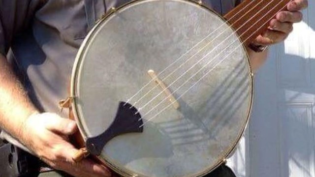 Man holding a banjo