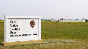 Fort Union's Entrance Sign with Fort in Background