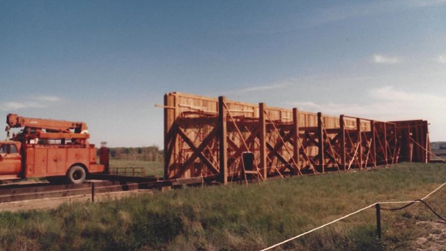 The southeast section of palisade wall under construction in 1989.