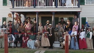 Rendezvous reenactors pose in front of the Bourgeois House.