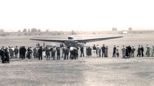 Historic photograph of ANT-25 aircraft landing at Pearson Field.