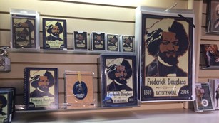 Products on a store shelf featuring a graphic of Douglass