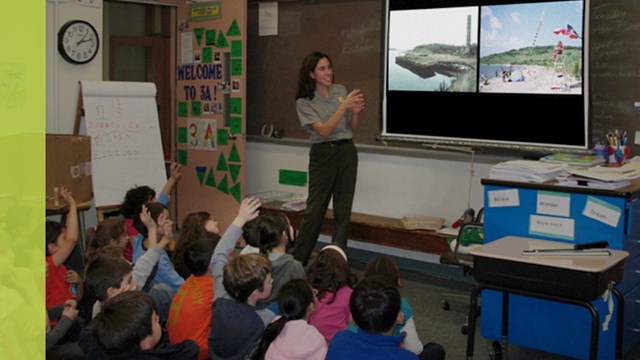 Ranger showing a slide show during a pre-visit to a classroom