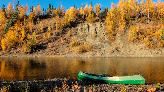 Canoe on shore along the bluffs above the Kobuk River