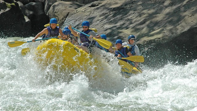 rafters in big whitewater