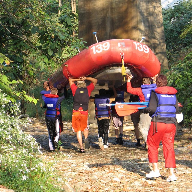 rafters carrying a raft