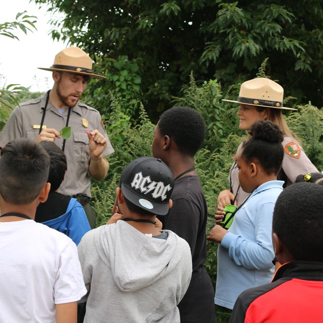 Park Rangers Erin and Corey with students
