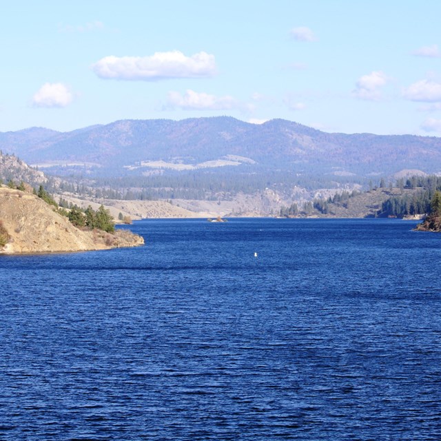 large reservoir with mountains 