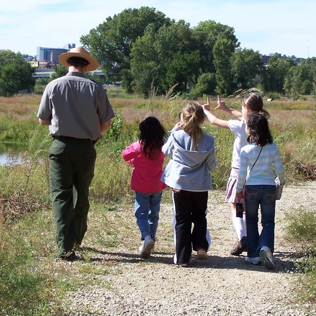 ranger walking with children