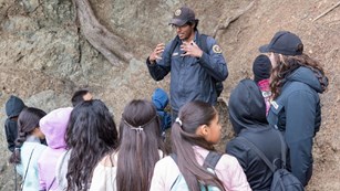 Volunteer giving a tour to a group