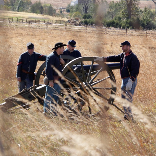 A group of Union living history performers on horseback. 