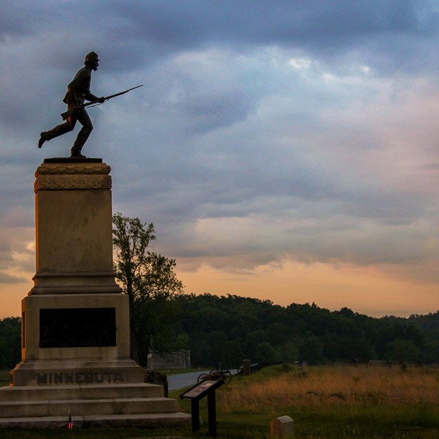 The cover of the Gettysburg Foundation Document features the 1st Minnesota monument.
