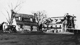 Historic image of the colonial kitchen and memorial house museum being built
