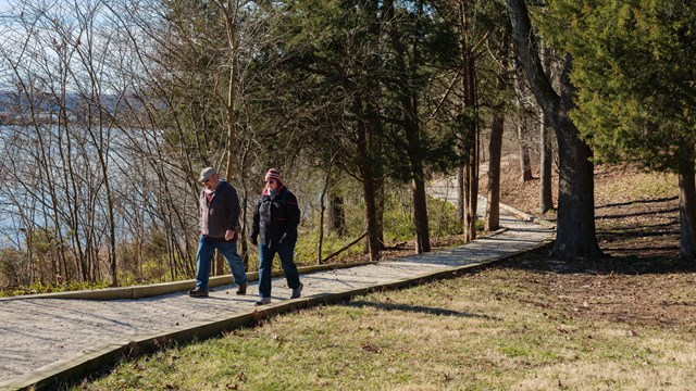 Loose gravel path with two people walking