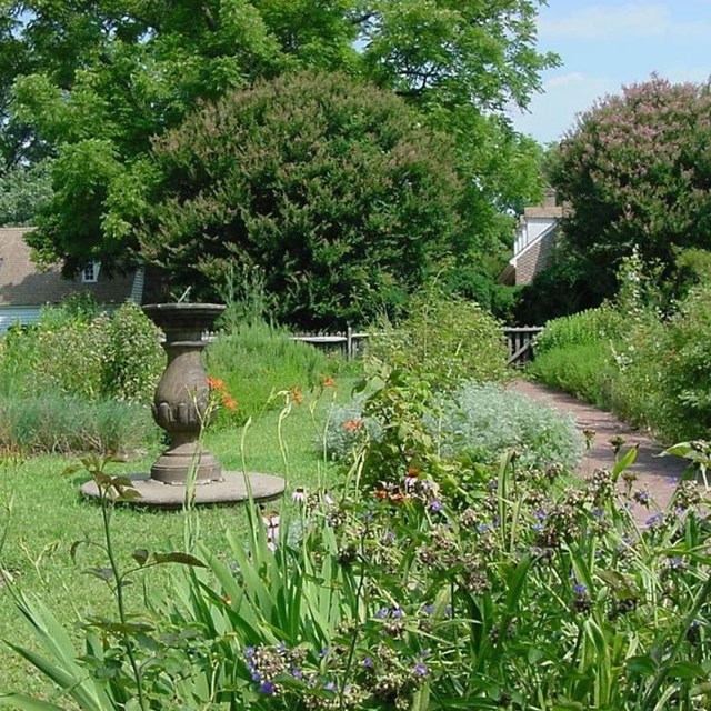 Colonial Revival Garden in spring with plants