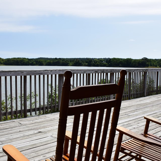 Rocking chair on deck overlooking Popes Creek