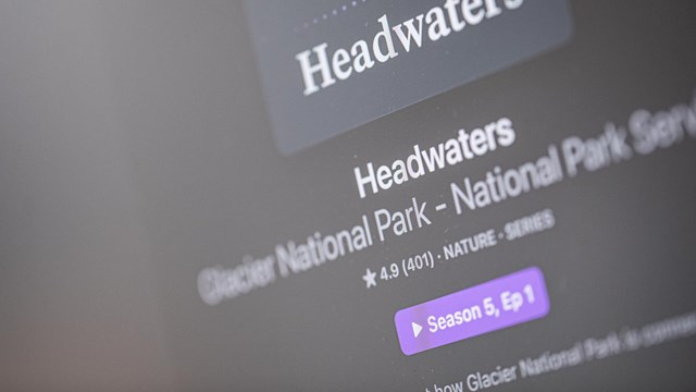 Very close up picture of apple podcasts on a screen