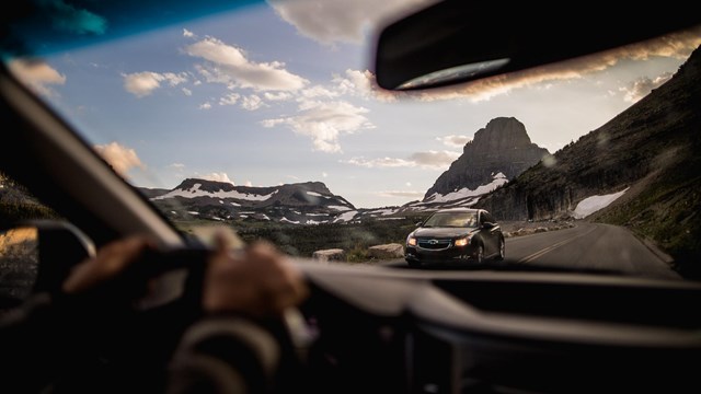 Through the windshield looking at Going-to-the-Sun Road. 