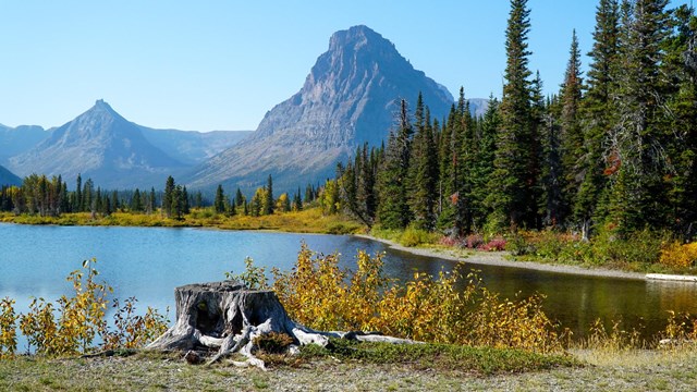 Mountain beyond a lake on a sunny day.