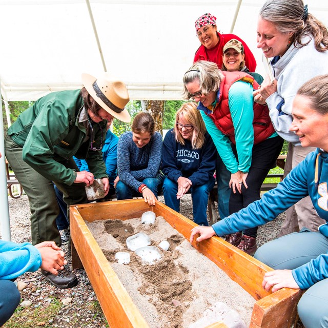 Ranger and teachers demonstrating glaciation