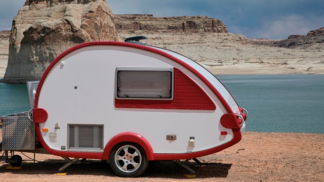 Teardrop camper parked on Lone Rock Beach