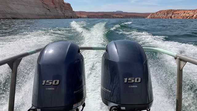 double boat engines and a wake in the water