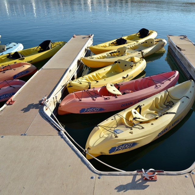 Colorful kayaks on the water