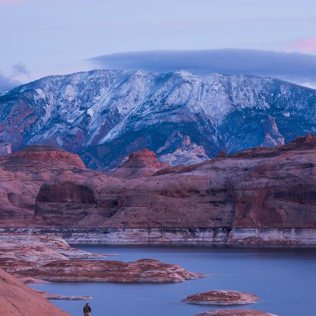 snow-capped mountain , lake in foreground