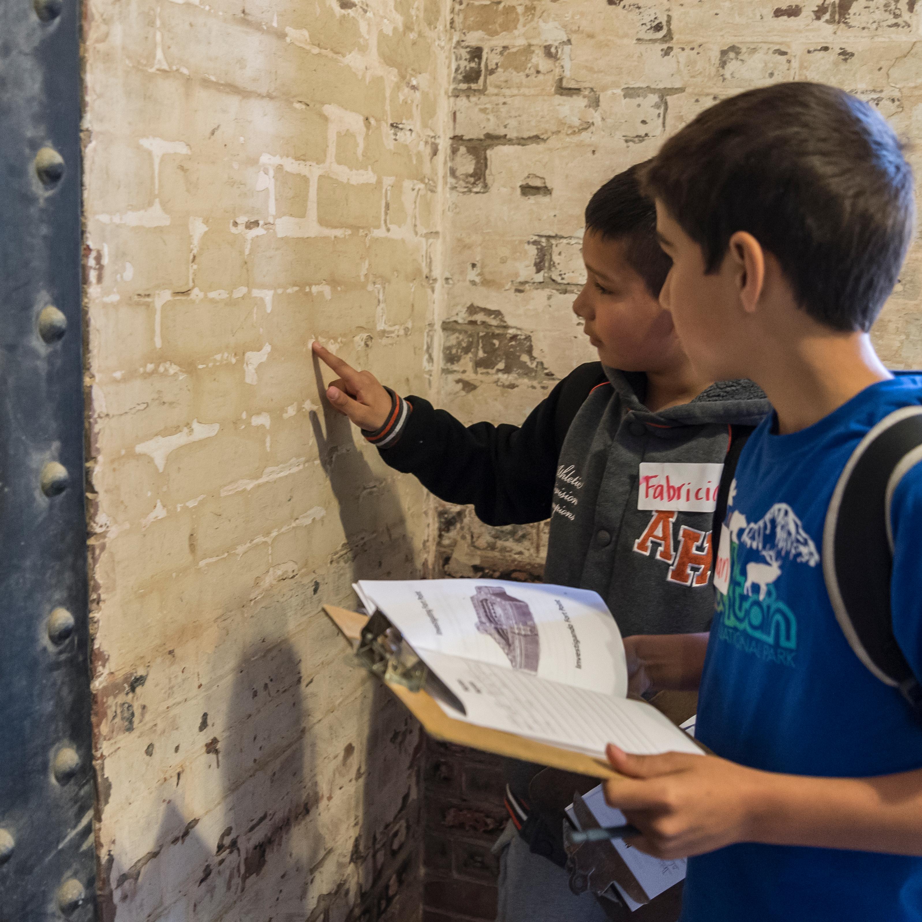Students stand on the roof of Fort Point