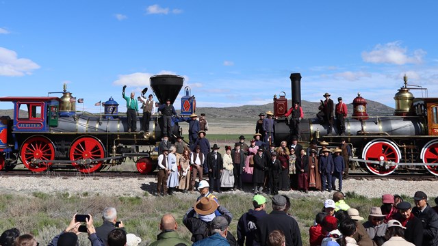 Visitors and Reenactors gathered in front of Locomotives